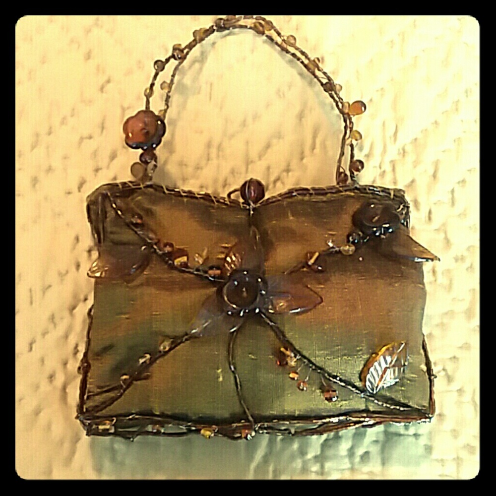 Bead embellished silk clutch